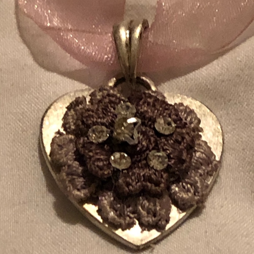 Pink roses and silver heart pendant